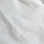 White And Wrinkled Sheet Of Paper Texture