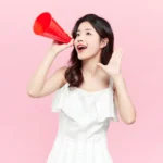 Jpg photo stock cô gái cầm loa girl holding a loudspeaker 16153