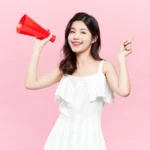 Jpg photo stock cô gái cầm loa girl holding a loudspeaker 16156