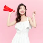 Jpg photo stock cô gái cầm loa girl holding a loudspeaker 16159