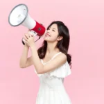 Jpg photo stock cô gái cầm loa girl holding a loudspeaker 16162