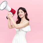 Jpg photo stock cô gái cầm loa girl holding a loudspeaker 16165